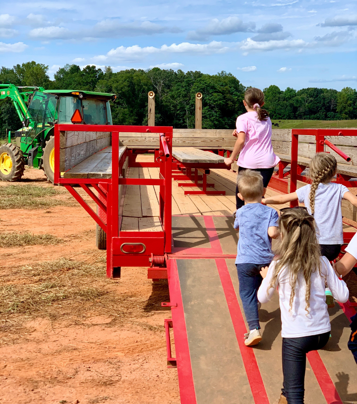 Kids getting on a hayride